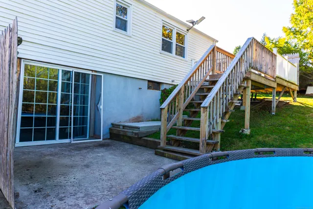 a view of a deck with furniture