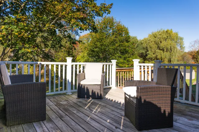 a view of swimming pool is middle in the garden