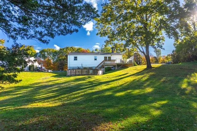 an aerial view of a house with a garden