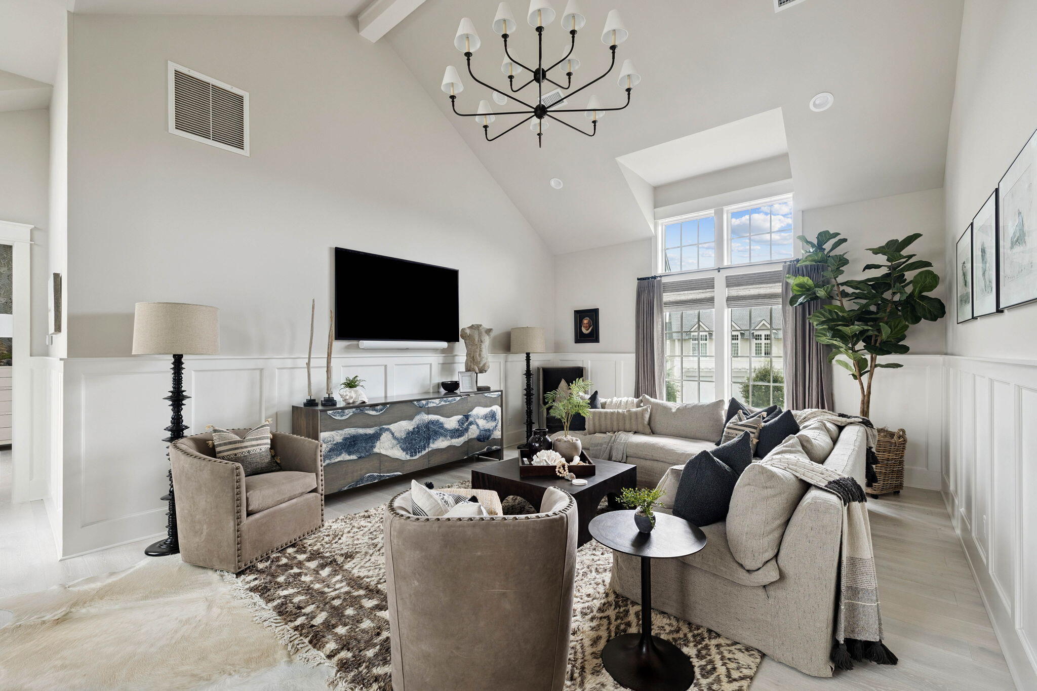 125 Golfridge Dr Inlet Beach Inlet Beach, FL 32461 - Photo 66 of 110 a living room with furniture a large window and a flat screen tv