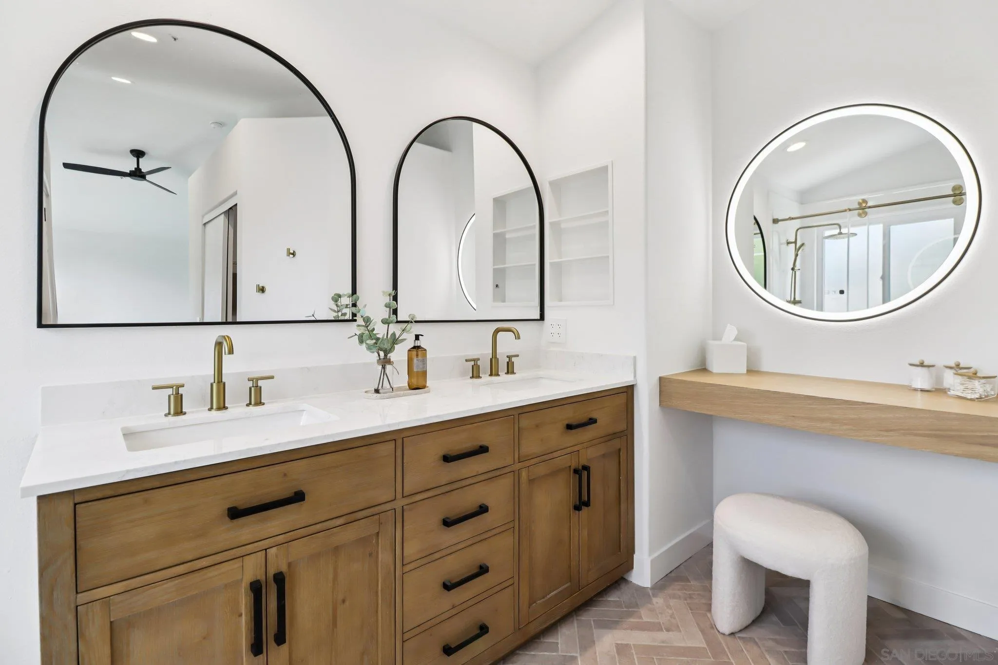 2082 Fairhope Loop Vista, CA 92081 - Photo 11 of 27 a bathroom with a double vanity sink and a mirror