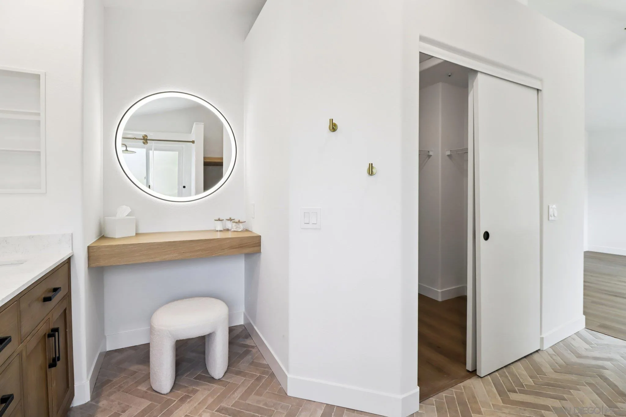 2082 Fairhope Loop Vista, CA 92081 - Photo 14 of 27 a bathroom with a toilet a sink and a mirror