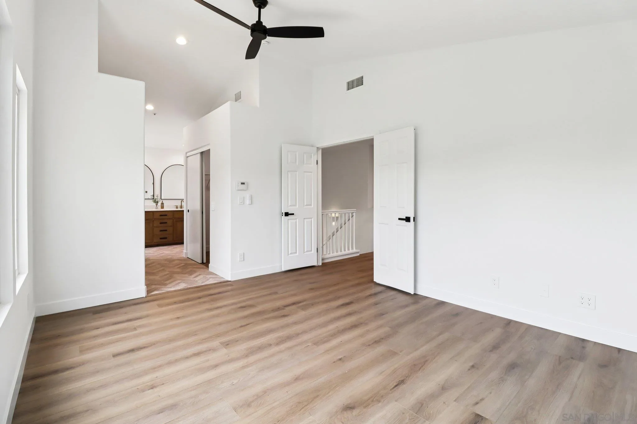 2082 Fairhope Loop Vista, CA 92081 - Photo 10 of 27 wooden floor in an empty room