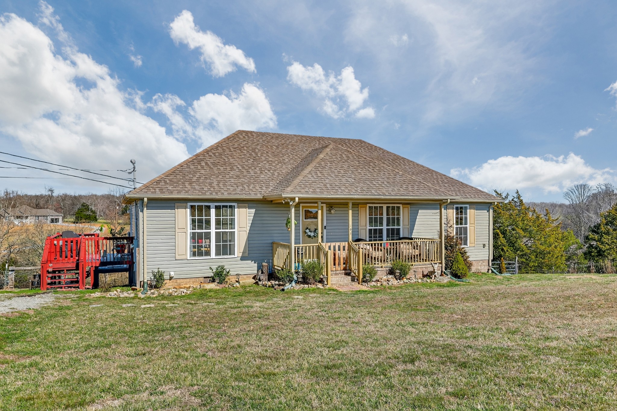 198 L Mitchell Road Flintville, TN 37335 - Photo 2 of 41 a front view of a house with garden