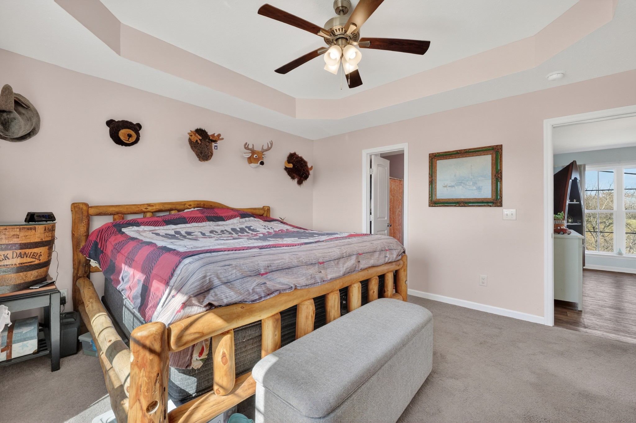 198 L Mitchell Road Flintville, TN 37335 - Photo 21 of 41 a bedroom with a bed and a chandelier