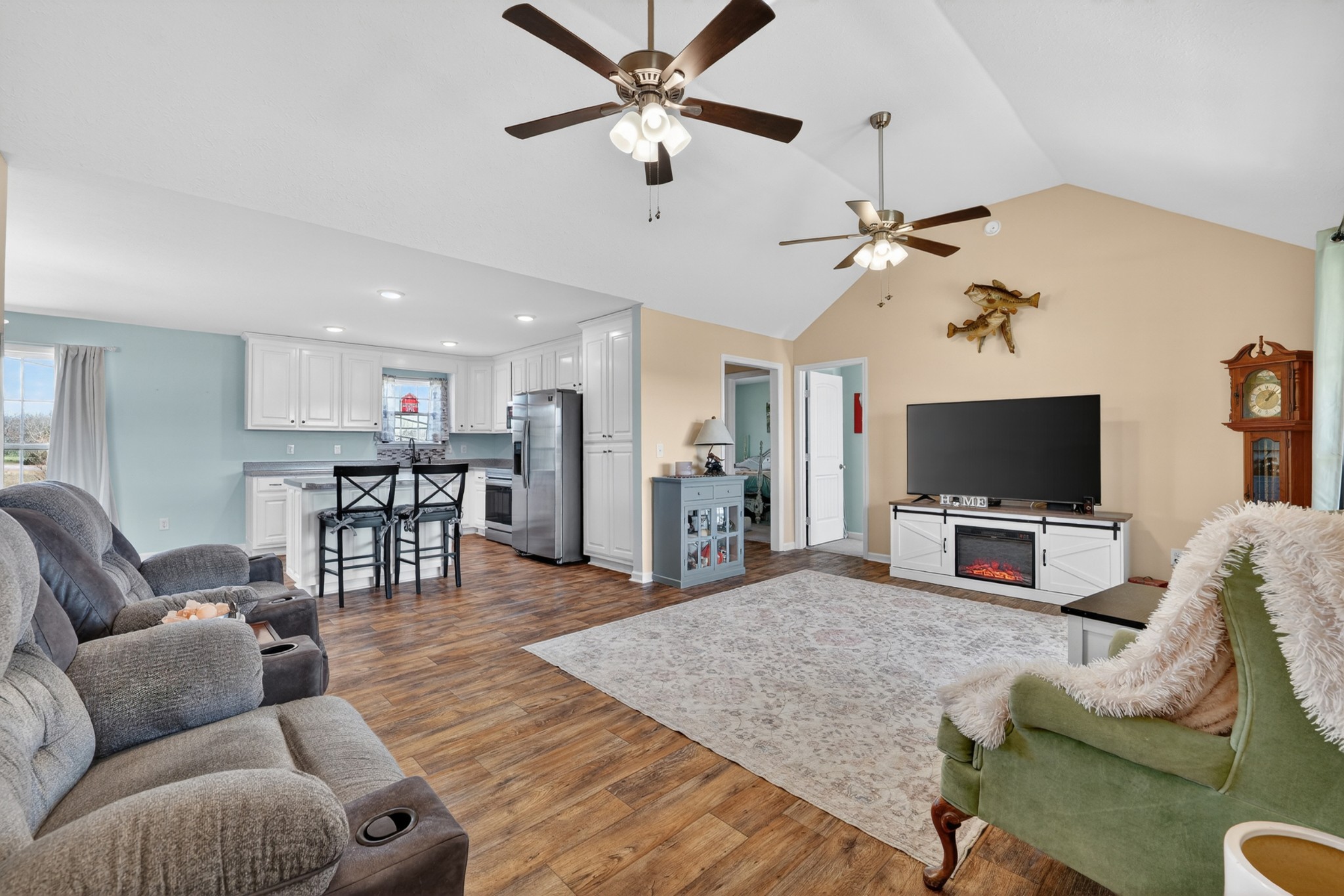 198 L Mitchell Road Flintville, TN 37335 - Photo 5 of 41 a living room with furniture and a flat screen tv