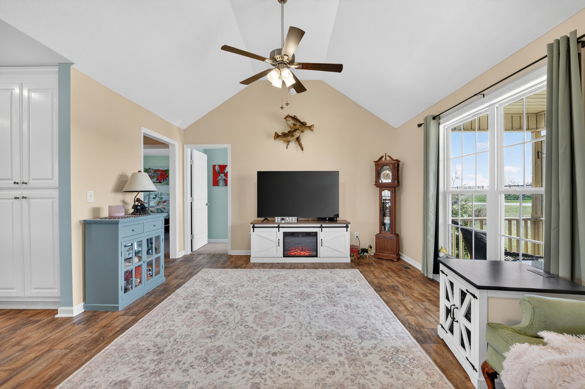 198 L Mitchell Road Flintville, TN 37335 - Photo 6 of 41 a living room with furniture and a flat screen tv