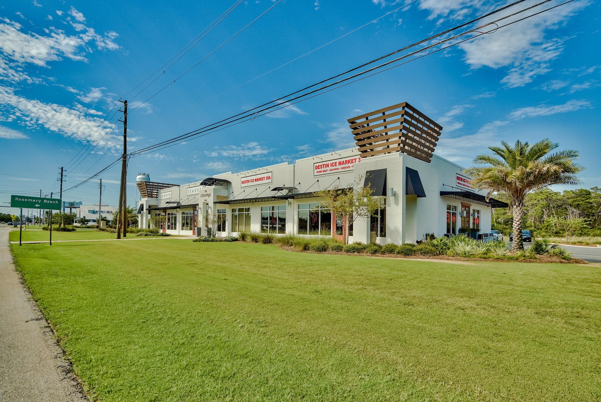 Lot 11 Willow Mist Road Inlet Beach, FL 32461 - Photo 13 of 18 a front view of a building with a garden