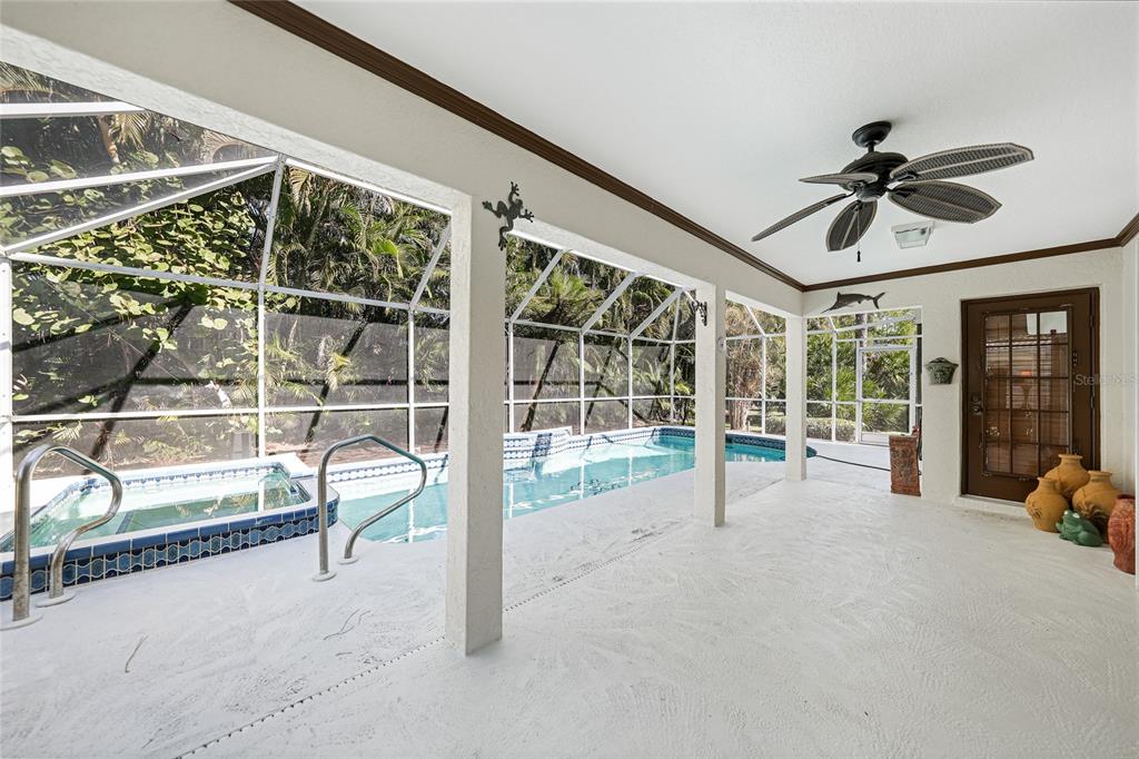 425 Islamorada Boulevard Punta Gorda, FL 33955 - Photo 24 of 44 a view of a livingroom with a furniture and floor to ceiling window