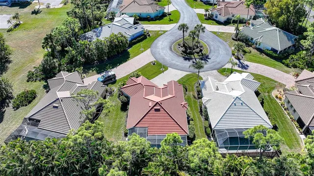 an aerial view of a houses with outdoor space