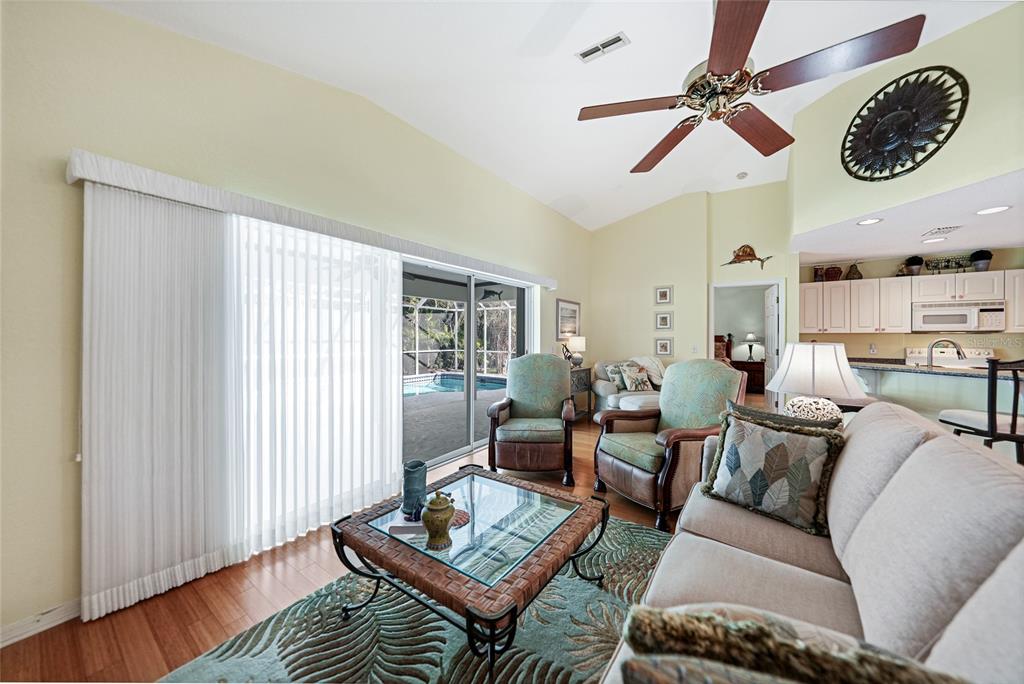 425 Islamorada Boulevard Punta Gorda, FL 33955 - Photo 5 of 44 a living room with furniture a rug and a window