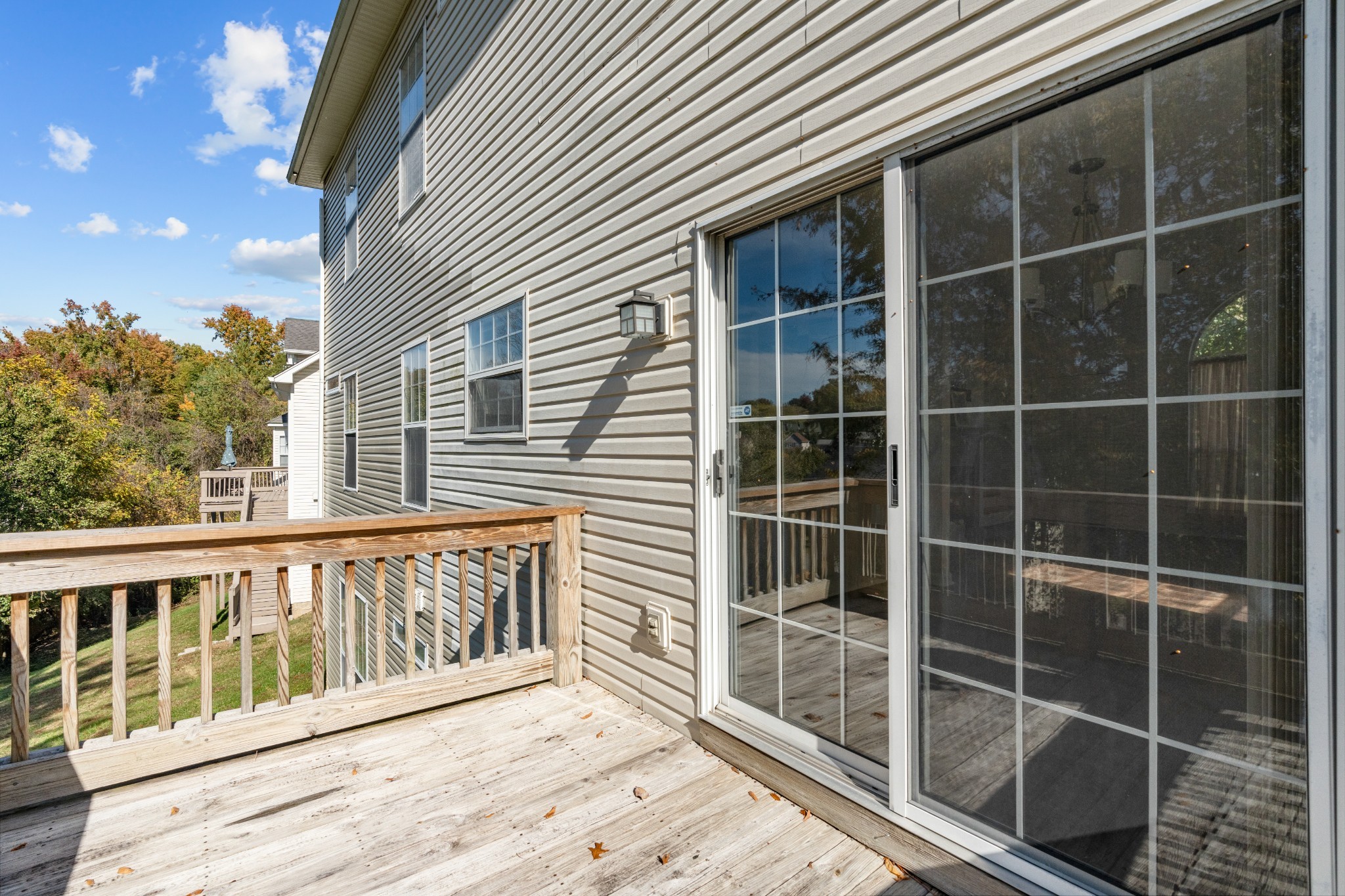 1068 Tulip Grove Road Hermitage, TN 37076 - Photo 18 of 100 a view of a balcony with a floor to ceiling window and wooden floor
