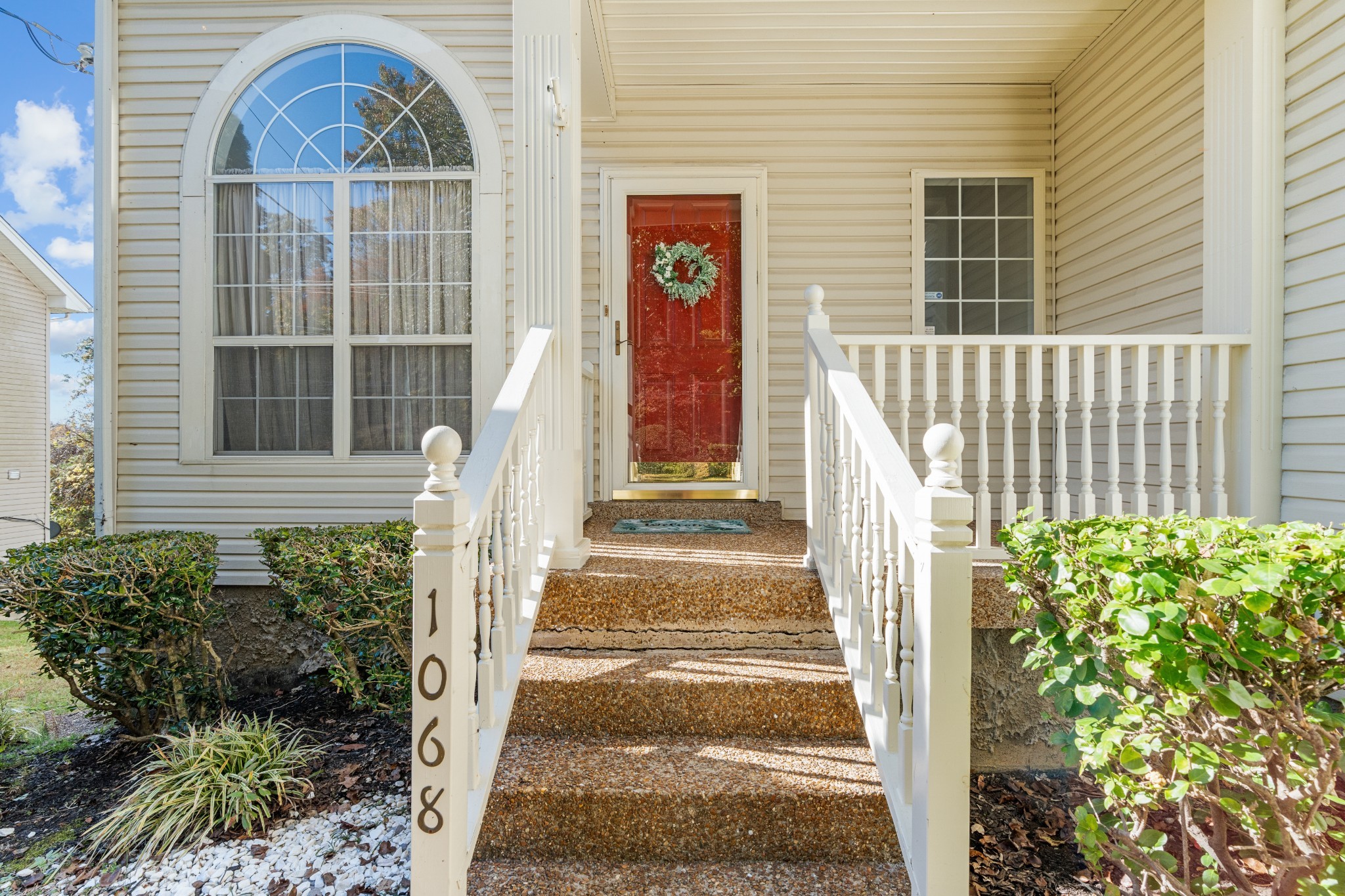1068 Tulip Grove Road Hermitage, TN 37076 - Photo 3 of 100 a front view of a house with a yard