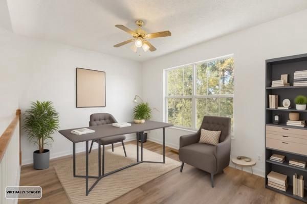 1068 Tulip Grove Road Hermitage, TN 37076 - Photo 53 of 100 a living room with furniture and a potted plant