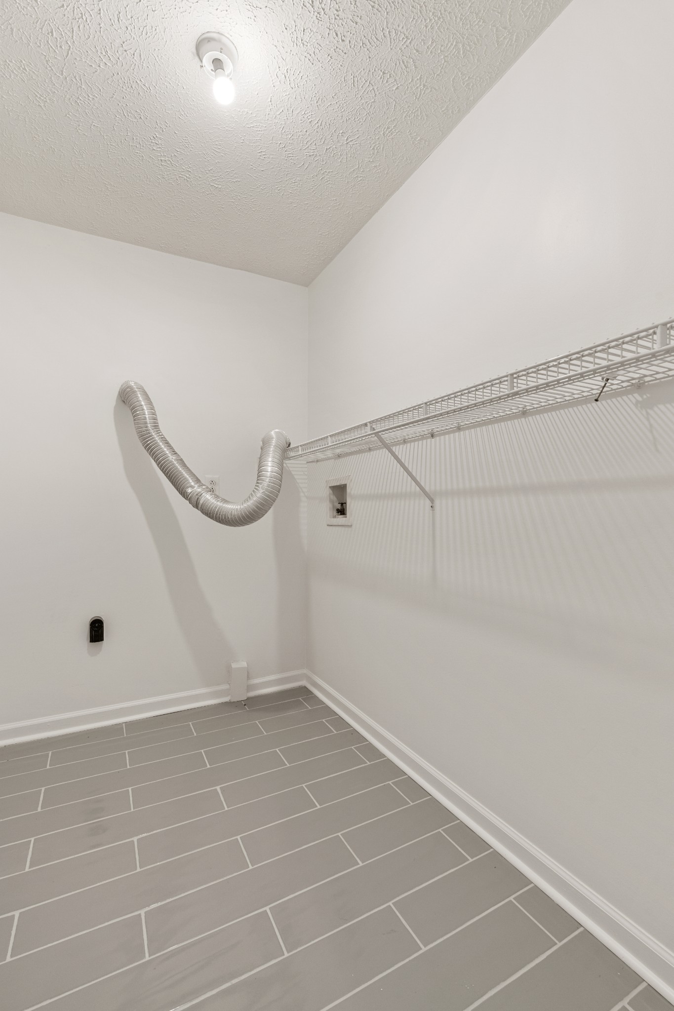 1068 Tulip Grove Road Hermitage, TN 37076 - Photo 76 of 100 a view of a room with racks on the wall