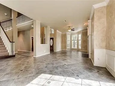 a view of a room with a large window