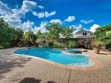 a view of a fountain in front of house