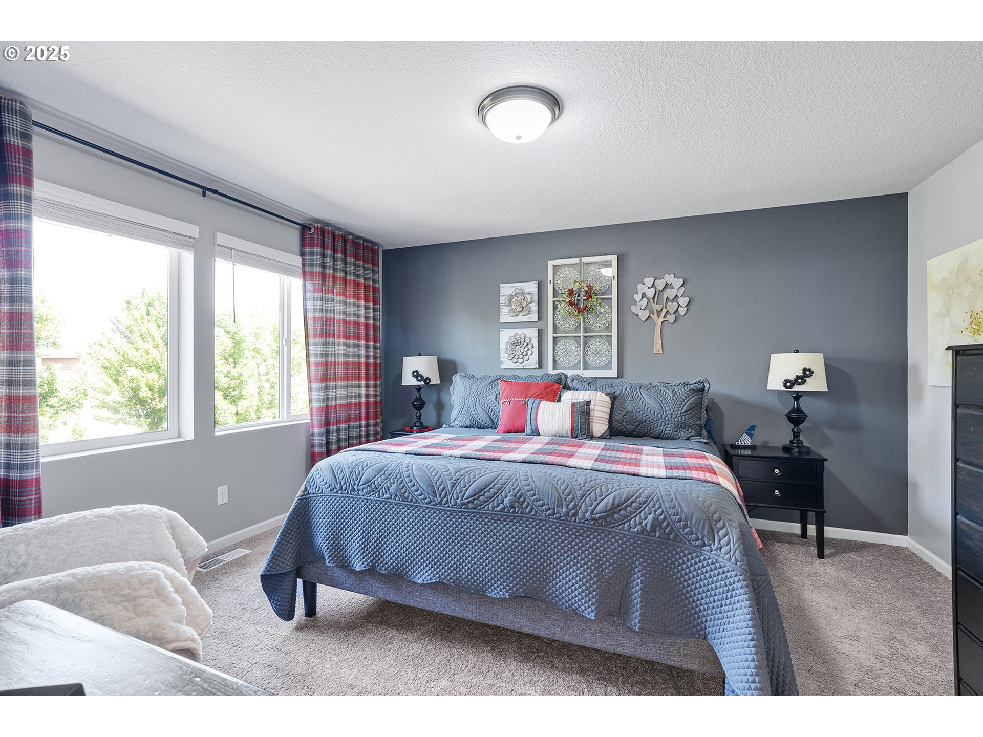 2091 35th Avenue Forest Grove, OR 97116 - Photo 21 of 43 a bedroom with a bed and window