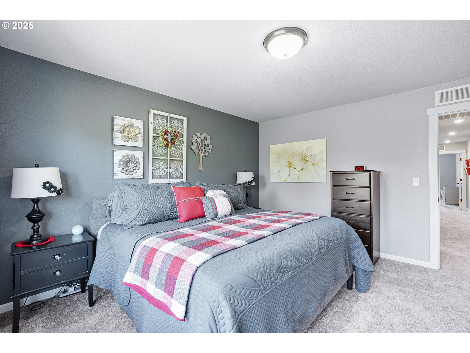 2091 35th Avenue Forest Grove, OR 97116 - Photo 22 of 43 a bedroom with a bed and a night stand