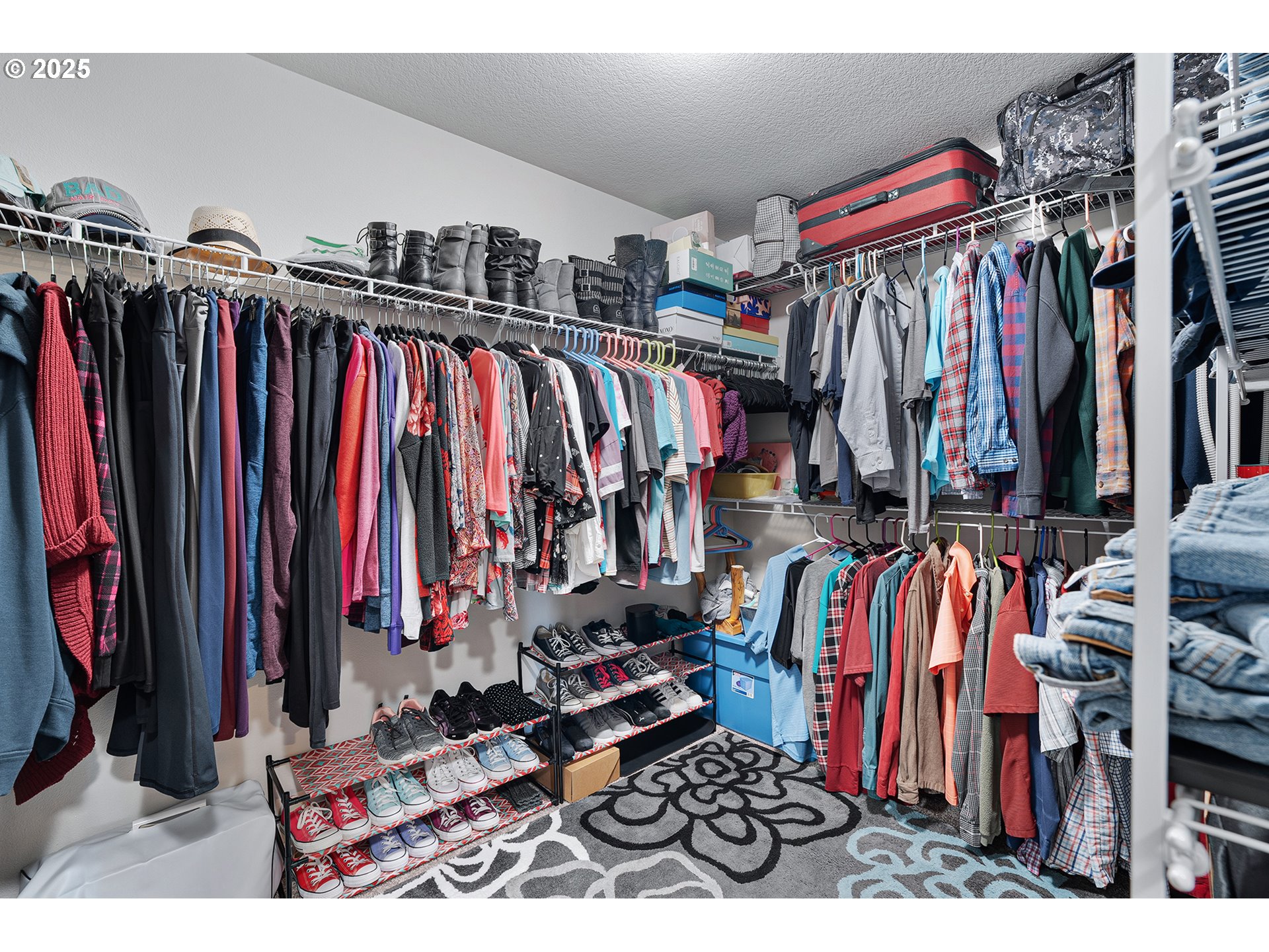 2091 35th Avenue Forest Grove, OR 97116 - Photo 28 of 43 a view of walk in closet with clothes