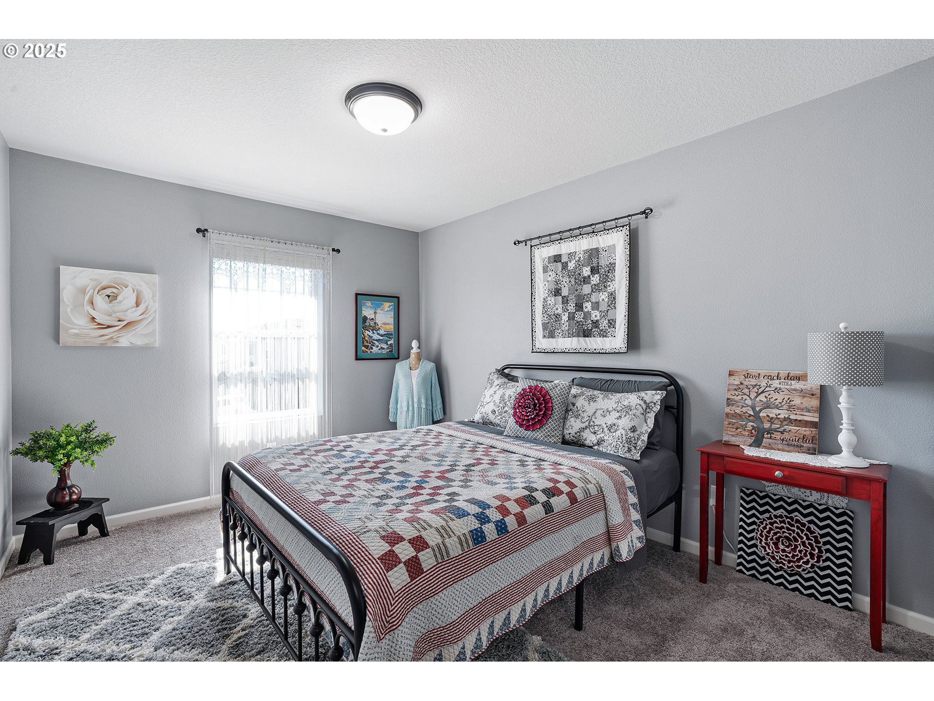 2091 35th Avenue Forest Grove, OR 97116 - Photo 29 of 43 a bedroom with a bed a table and chair