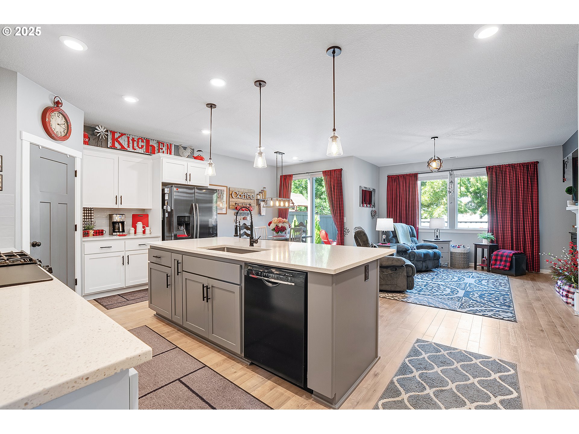 2091 35th Avenue Forest Grove, OR 97116 - Photo 7 of 43 a kitchen with stainless steel appliances granite countertop a sink counter space cabinets and a window