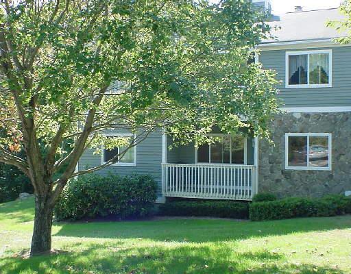 214 Windgate Circle, Unit A Monroe, CT 06468 - Photo 1 of 1 a view of a house with a yard and a garden