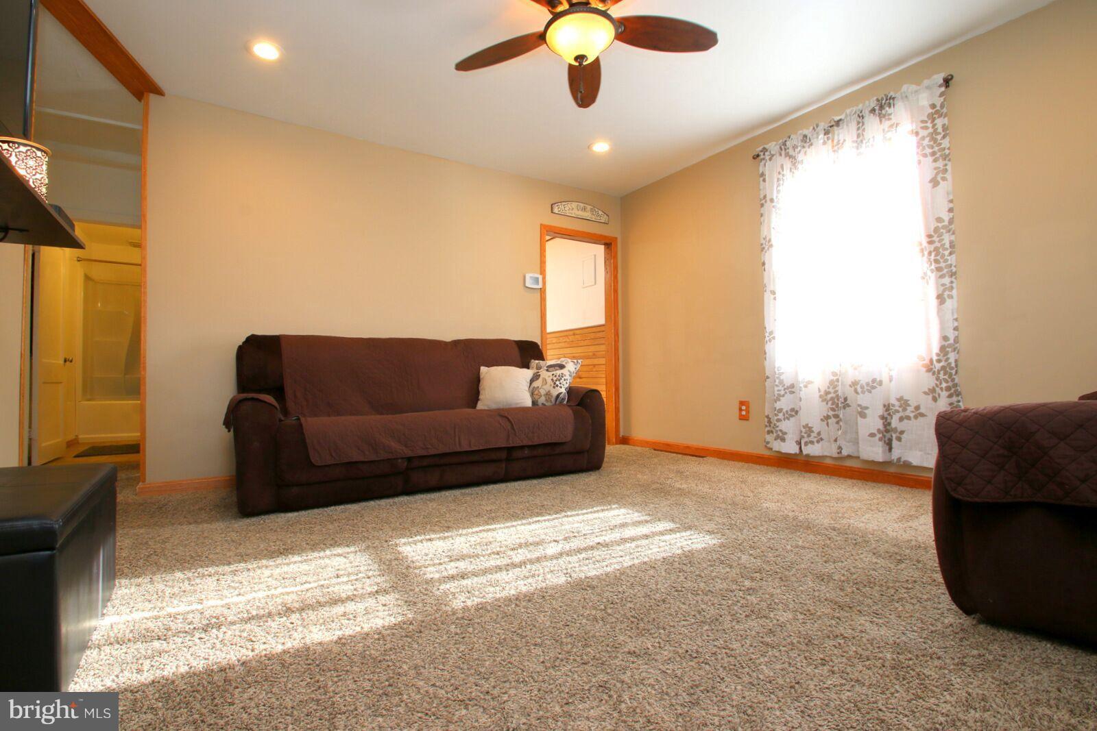 957 Martin Road Baltimore, MD 21221 - Photo 4 of 30 a living room with furniture and a window