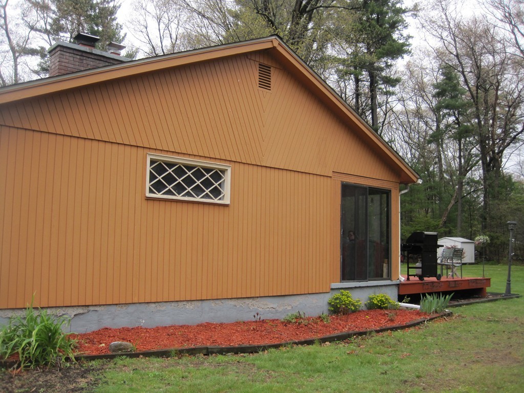 15 Kimbrough Road Billerica, MA 01821 - Photo 11 of 15 a backyard of a house with seating space
