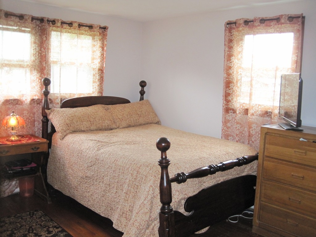 15 Kimbrough Road Billerica, MA 01821 - Photo 7 of 15 a bedroom with a bed and a window