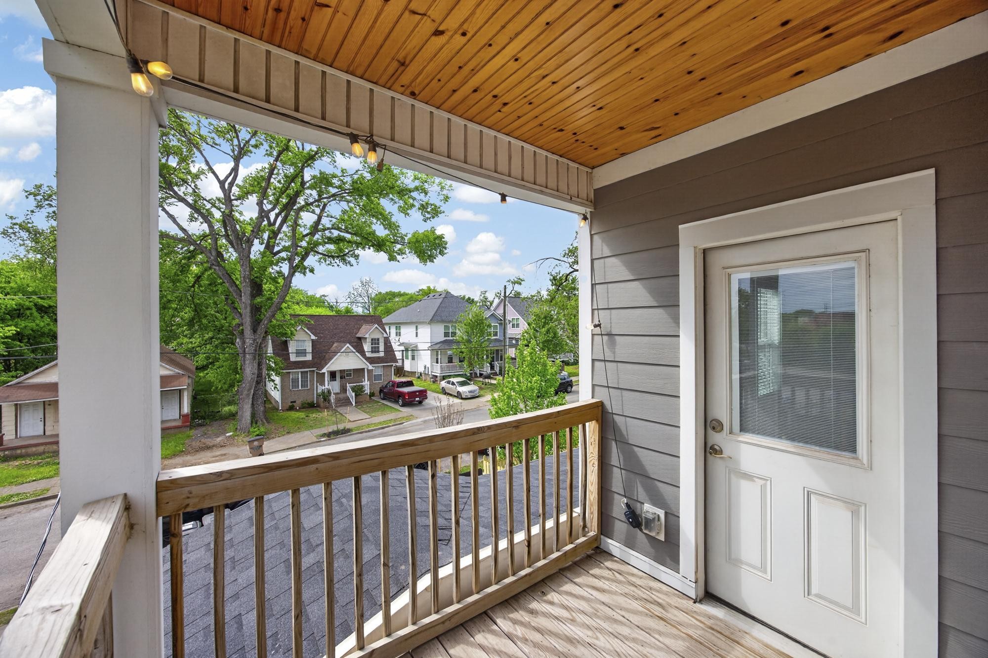 7 Decatur Street Nashville, TN 37210 - Photo 39 of 43 a view of a porch with wooden floor and outdoor space
