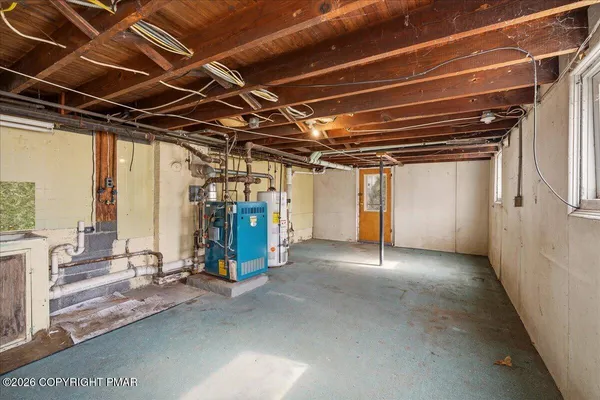 a view of an empty room with a garage