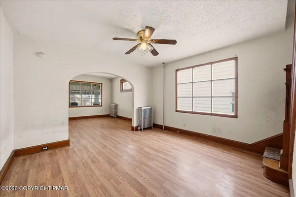 an empty room with windows