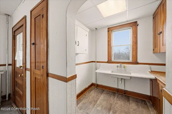 a white building with a white door