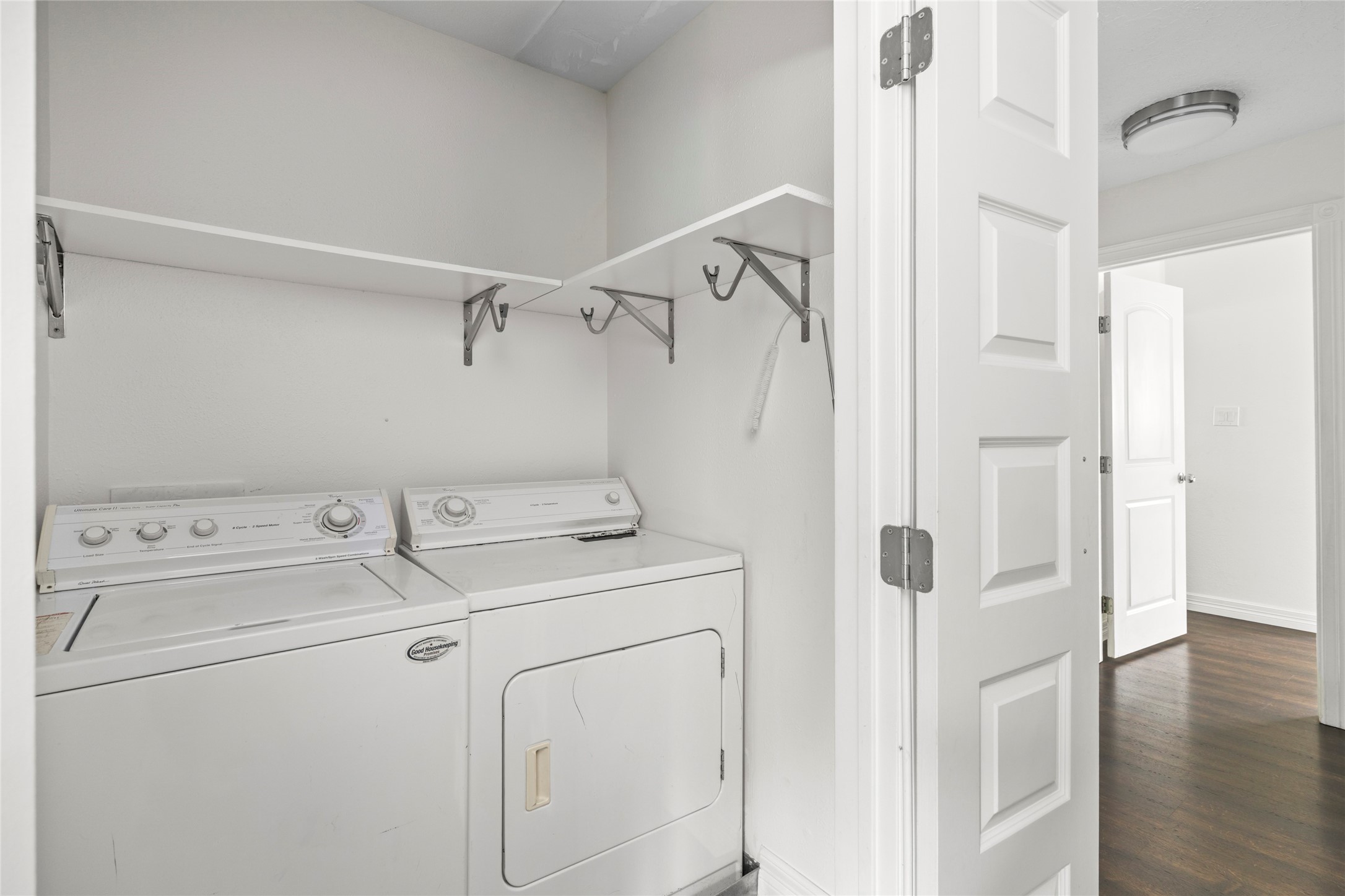 560 Landfall Lane Conroe, TX 77302 - Photo 33 of 41 The laundry room is located upstairs.