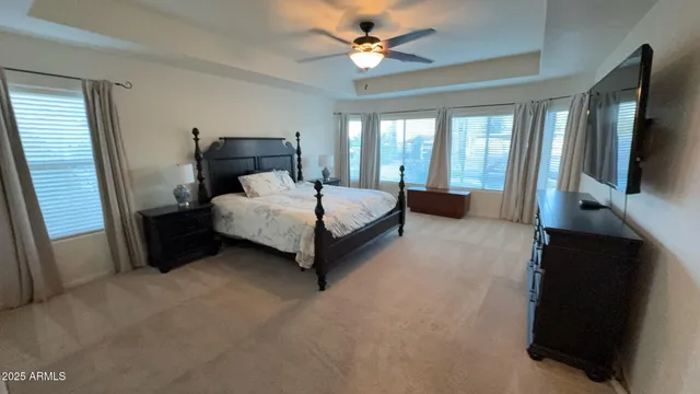 a view of kitchen with furniture and electronic appliances