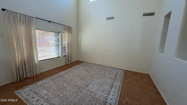 a living room with a couch and a flat screen tv