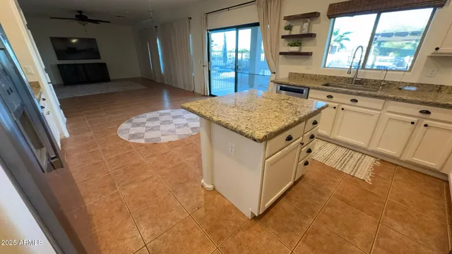 a view of a kitchen with a sink