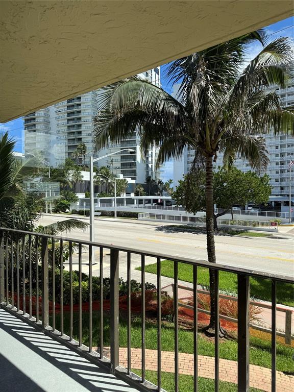 1009 North Ocean Boulevard, Unit 212 Pompano Beach, FL 33062 - Photo 11 of 23 a view of a swimming pool with a patio