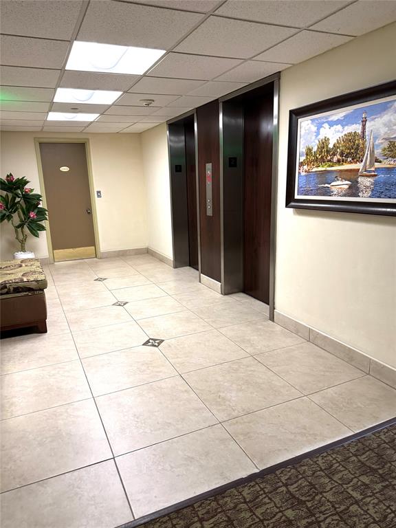 1009 North Ocean Boulevard, Unit 212 Pompano Beach, FL 33062 - Photo 15 of 23 a view of a livingroom with wooden floor