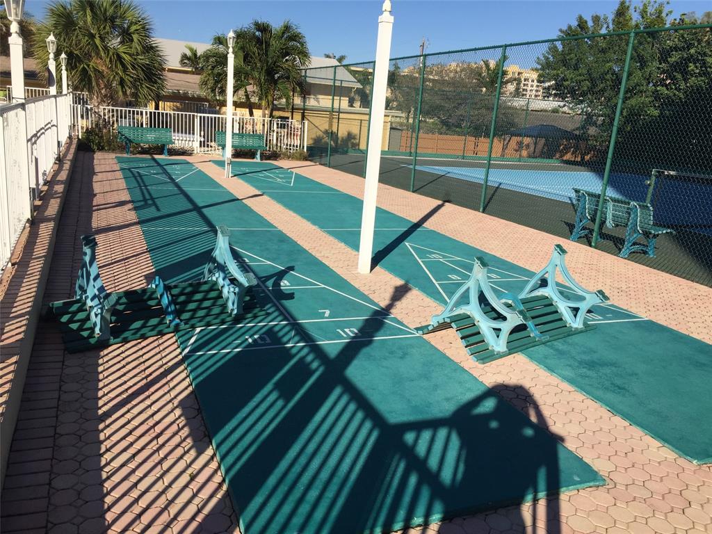 1009 North Ocean Boulevard, Unit 212 Pompano Beach, FL 33062 - Photo 19 of 23 a view of a backyard