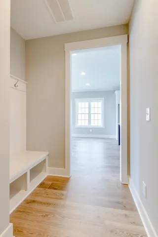 a view of a livingroom with a ceiling fan and window