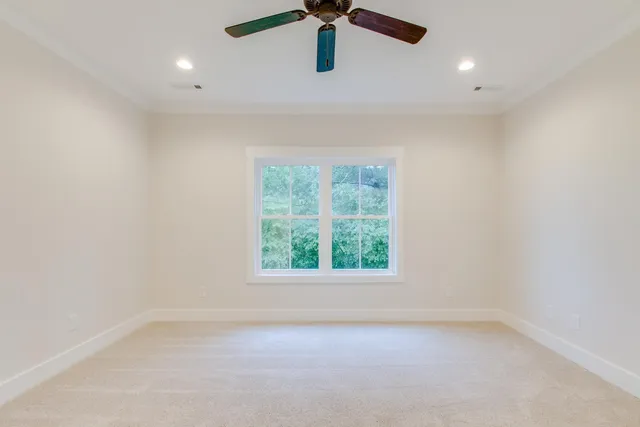 a bathroom with a granite countertop sink mirror and double