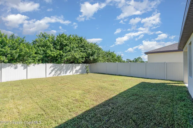 a view of outdoor space and yard