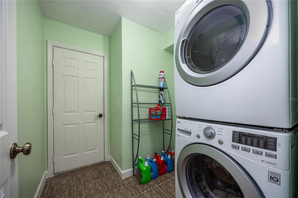 5829 Southwest 86th Street Gainesville, FL 32608 - Photo 26 of 57 Laundry room by garage