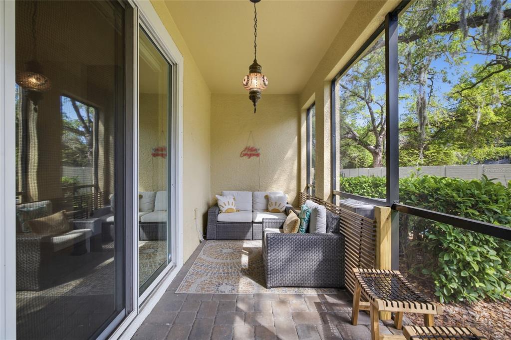 2013 Sunset Wind Loop Oldsmar, FL 34677 - Photo 29 of 43 a living room with furniture and a floor to ceiling window