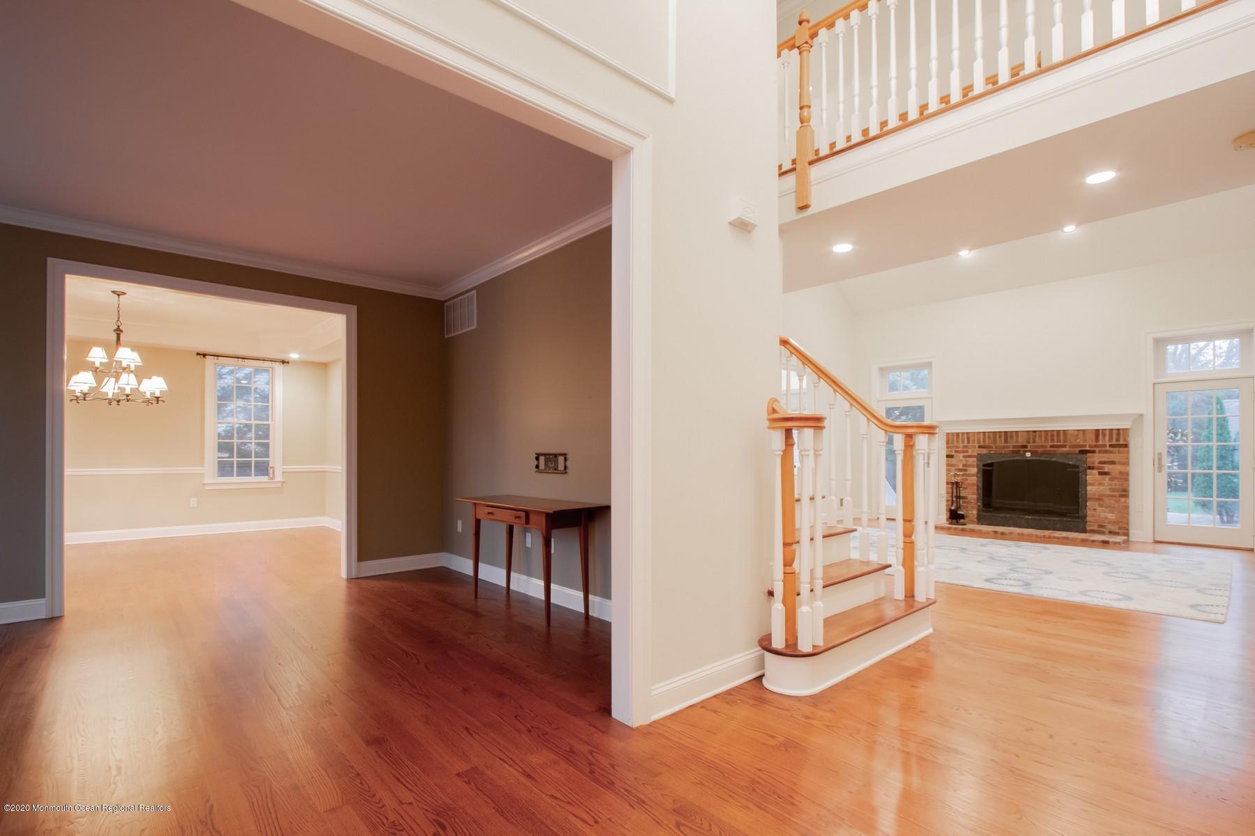 63 River Road Rumson, NJ 07760 - Photo 15 of 37 a view interior of a house with wooden floor fireplace and windows