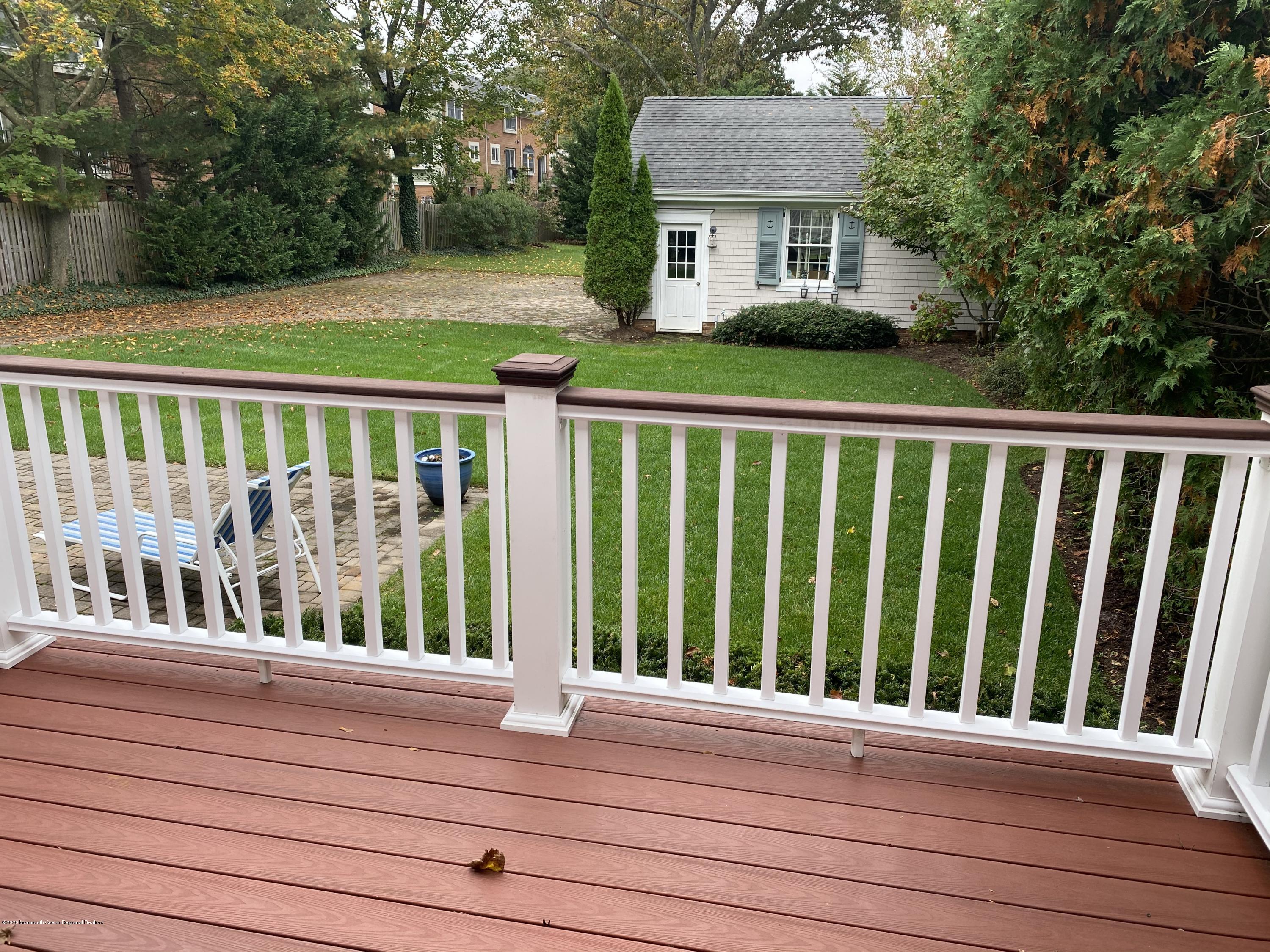 63 River Road Rumson, NJ 07760 - Photo 19 of 37 a view of a deck and yard