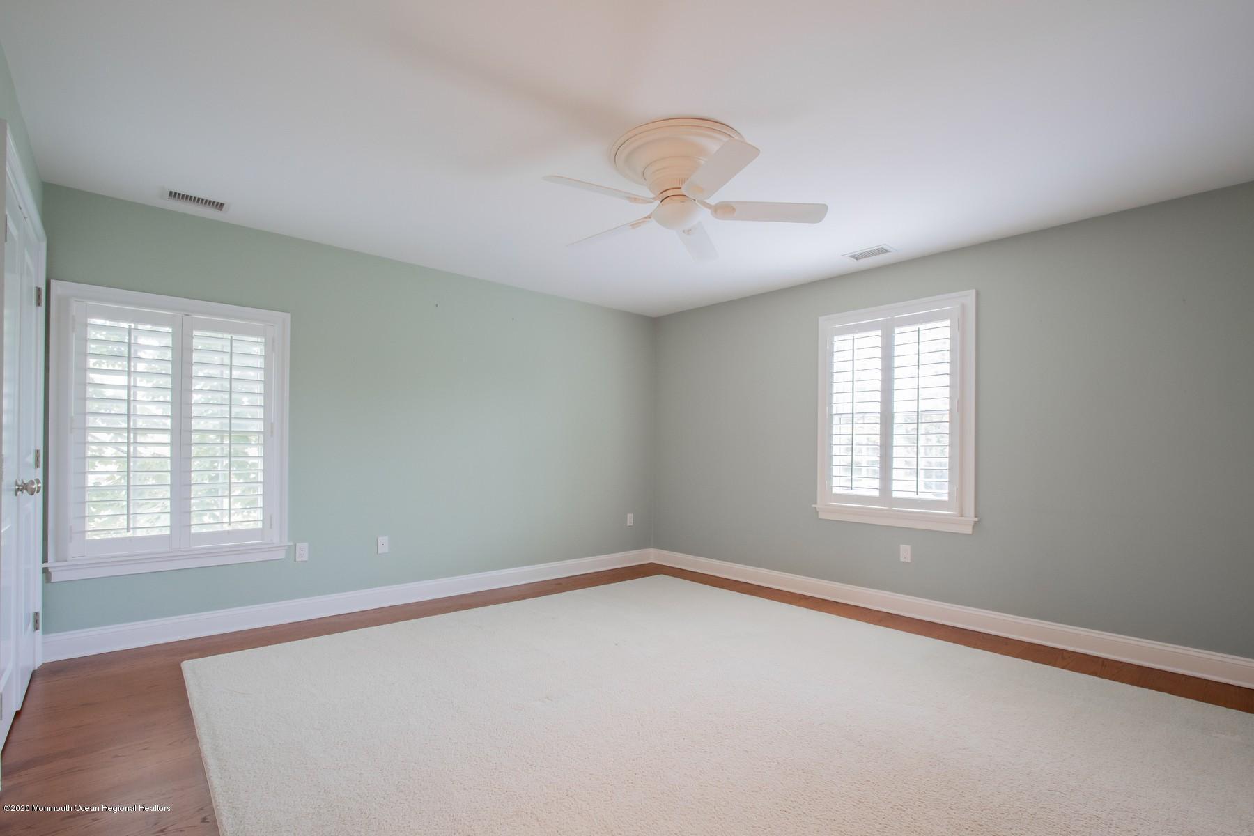 63 River Road Rumson, NJ 07760 - Photo 24 of 37 a view of an empty room with a window