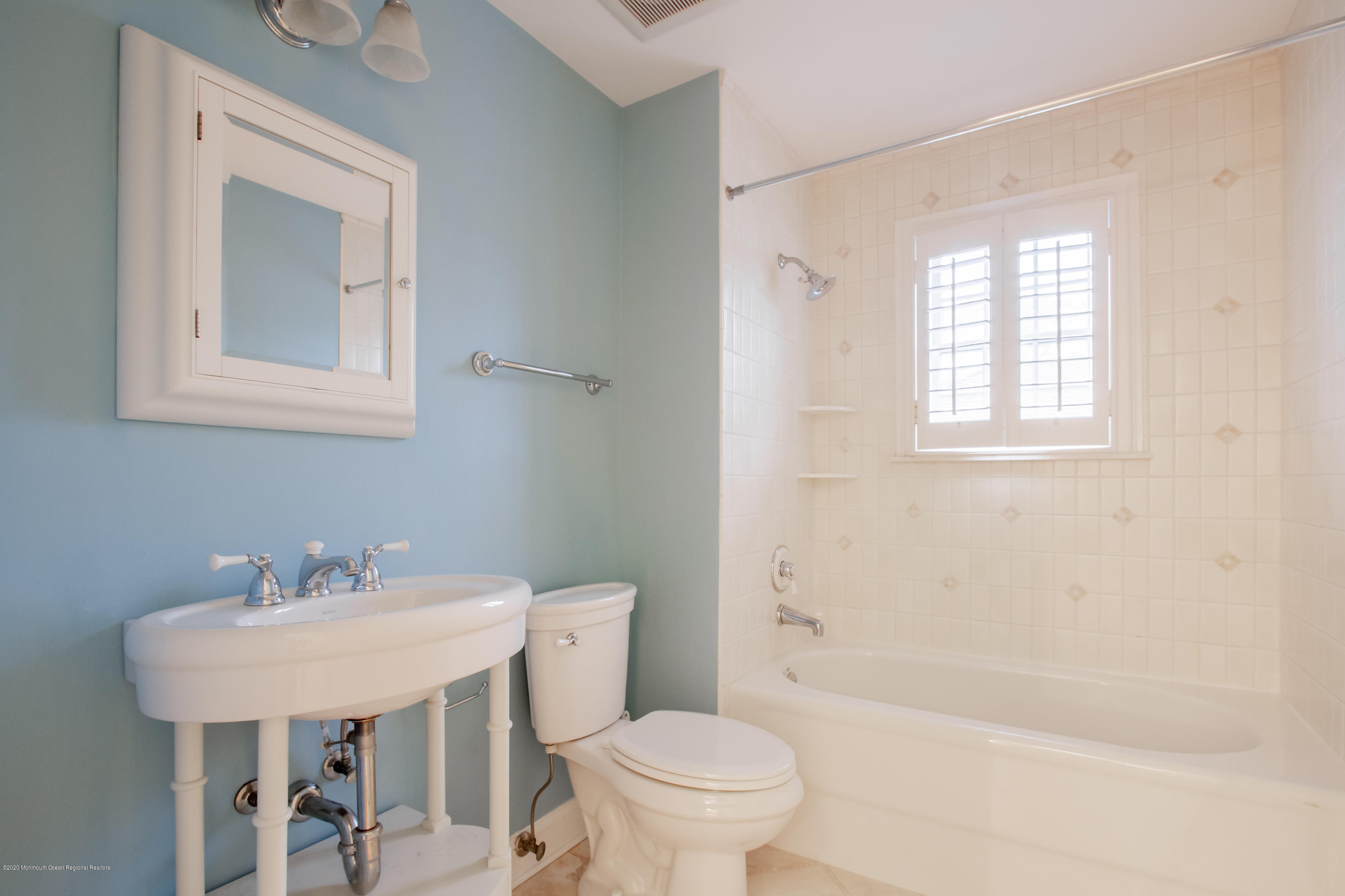 63 River Road Rumson, NJ 07760 - Photo 30 of 37 a bathroom with a sink toilet and a bathtub